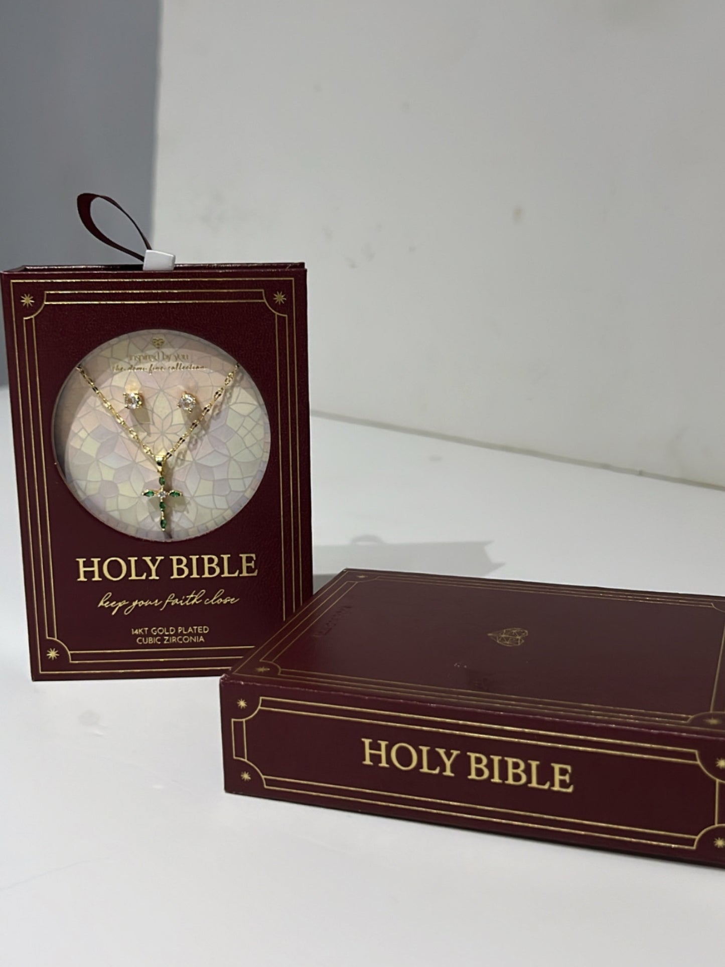 14 karat gold plated emerald cross with cubic zirconia studs it a lovely Holy Bible presentation box