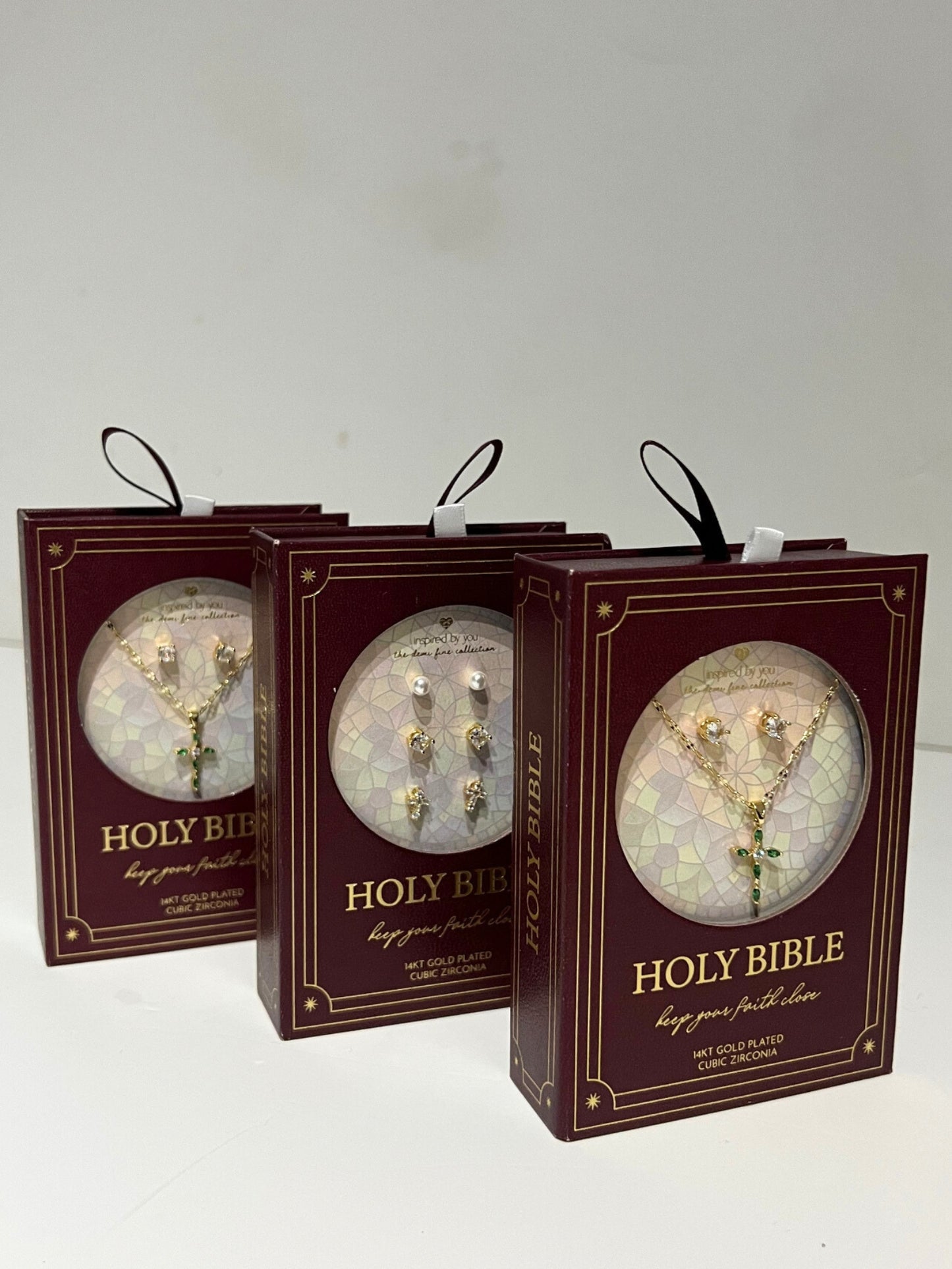 14 karat gold plated emerald cross with cubic zirconia studs it a lovely Holy Bible presentation box